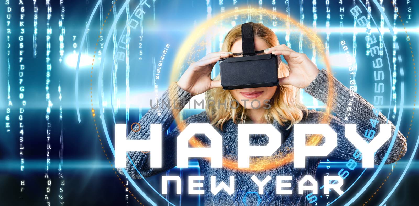 Composite image of smiling blond woman using virtual reality headset by Wavebreakmedia