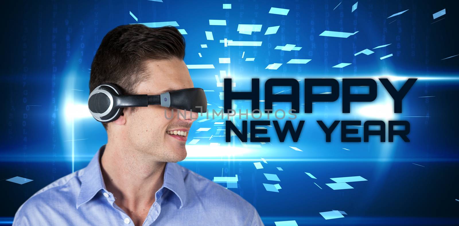 Composite image of happy handsome man with virtual reality simulator by Wavebreakmedia