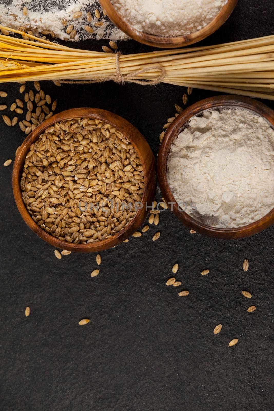Wheat grains and flour by Wavebreakmedia