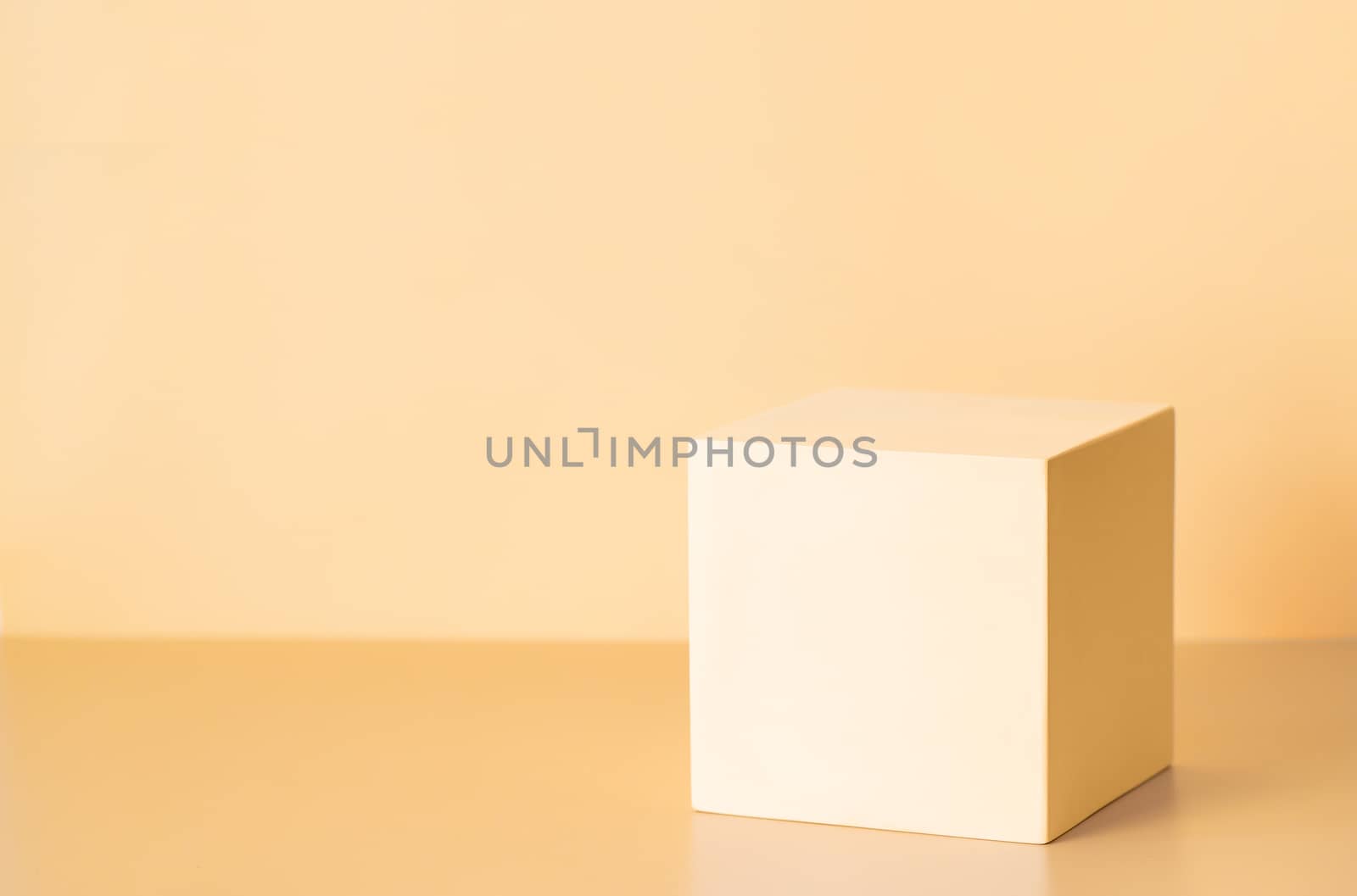 Abstract background for branding, identity and packaging presentation. Light yellow cub podium on cream yellow paper background. Copy space for text, design or mock up product