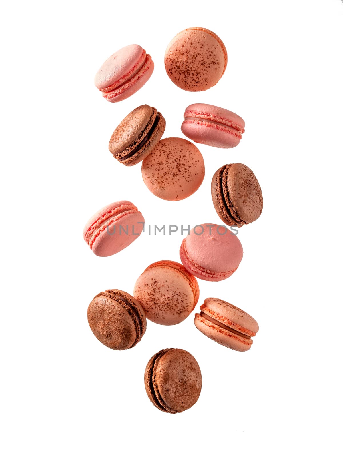 Flying or falling macarons, isolated on white by fascinadora