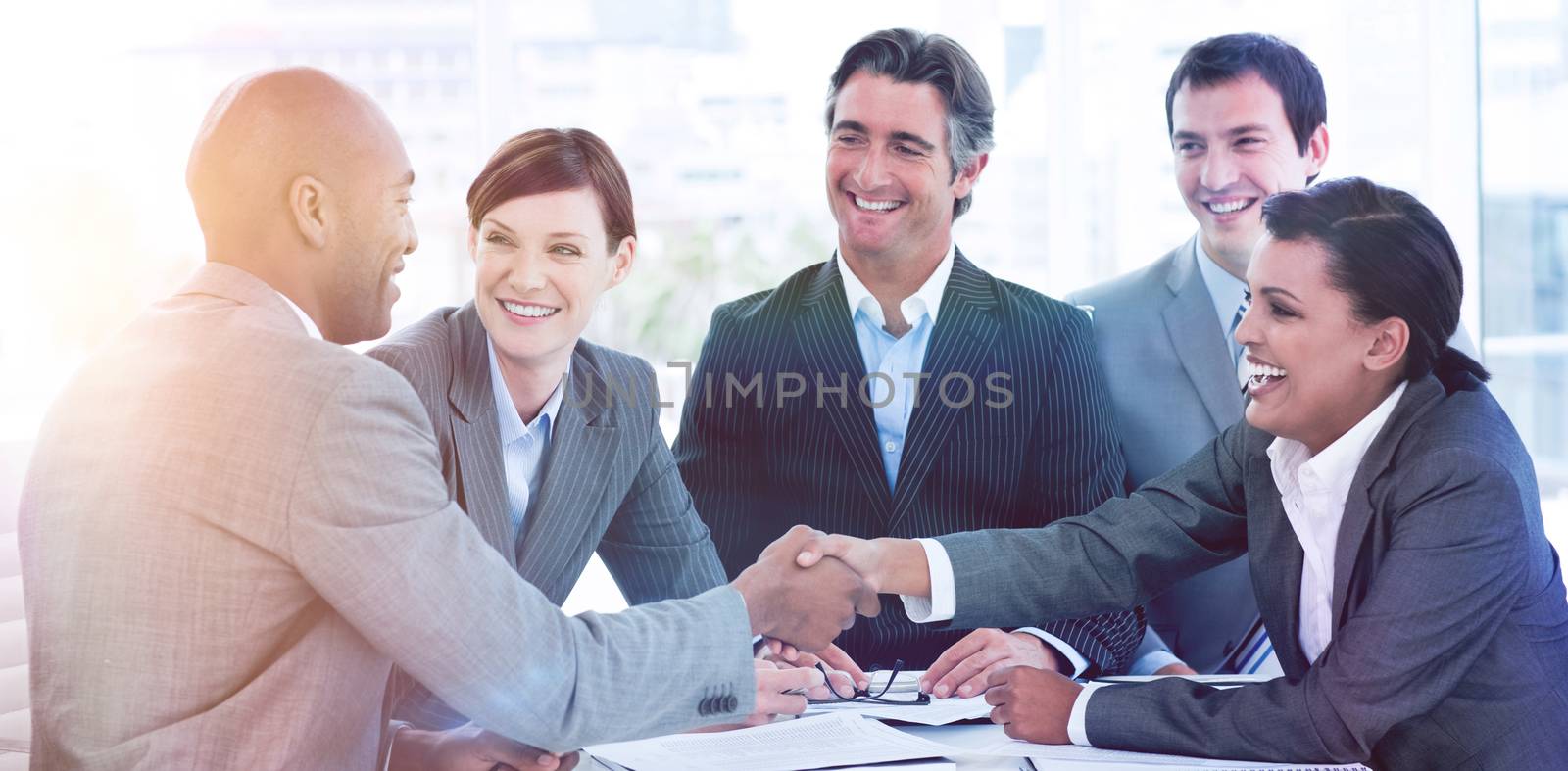 Business people greeting each other in a meeting