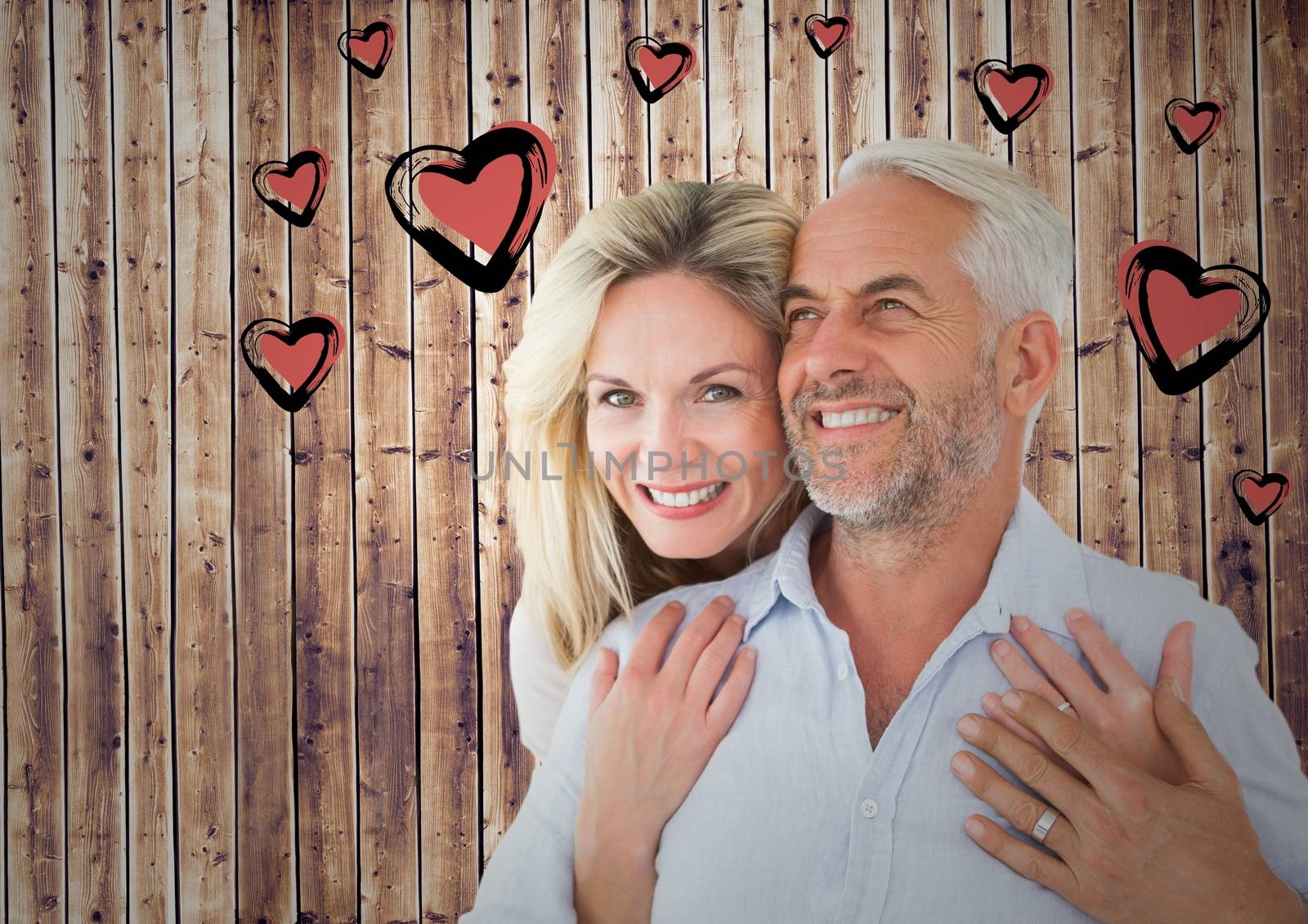 Digital composite image of mature romantic couple and heart graphic