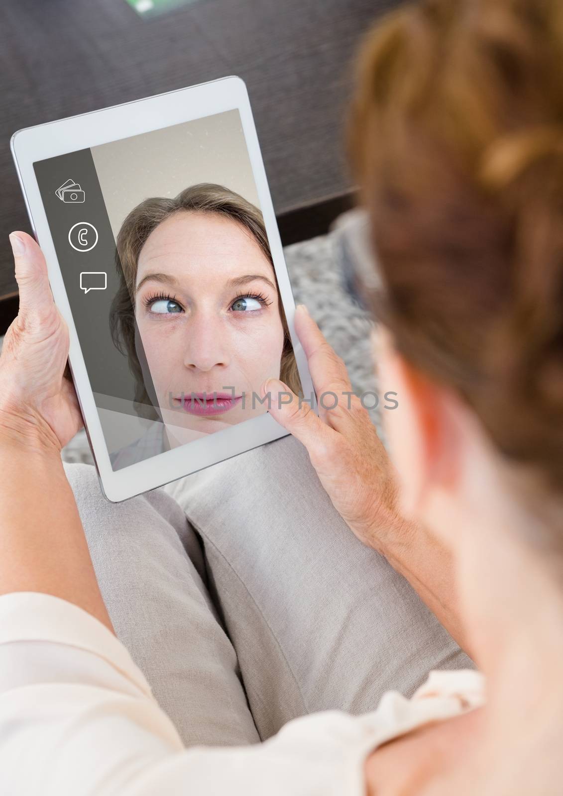 Woman having a video call at home by Wavebreakmedia