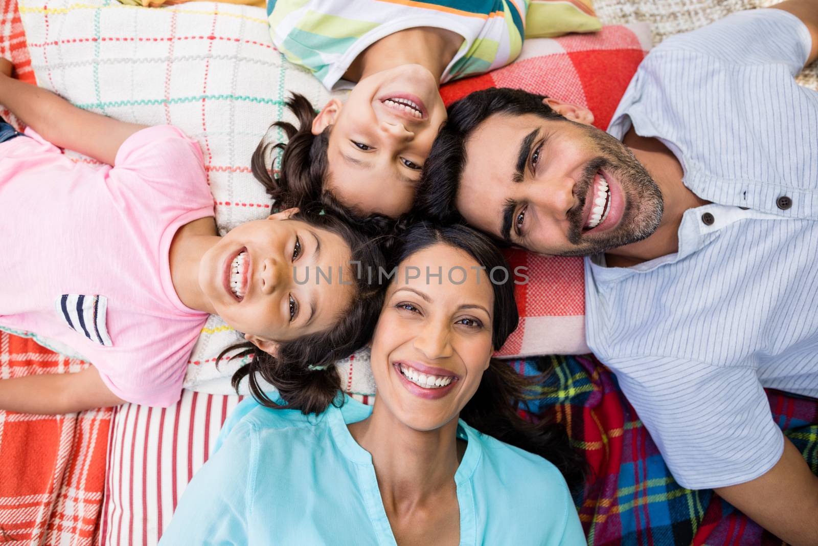 Portrait of family having fun in park by Wavebreakmedia