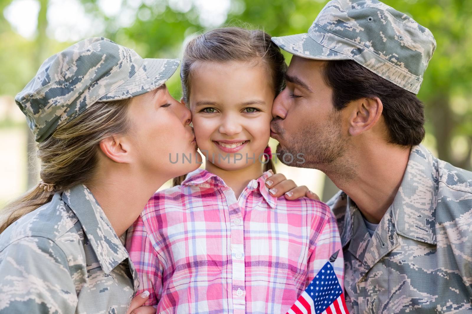Military couple with their daughter by Wavebreakmedia