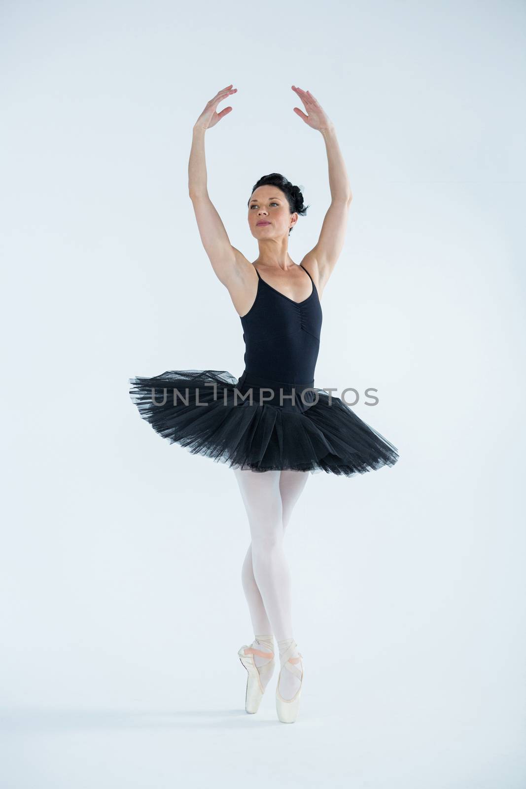 Ballerina practicing ballet dance in the studio