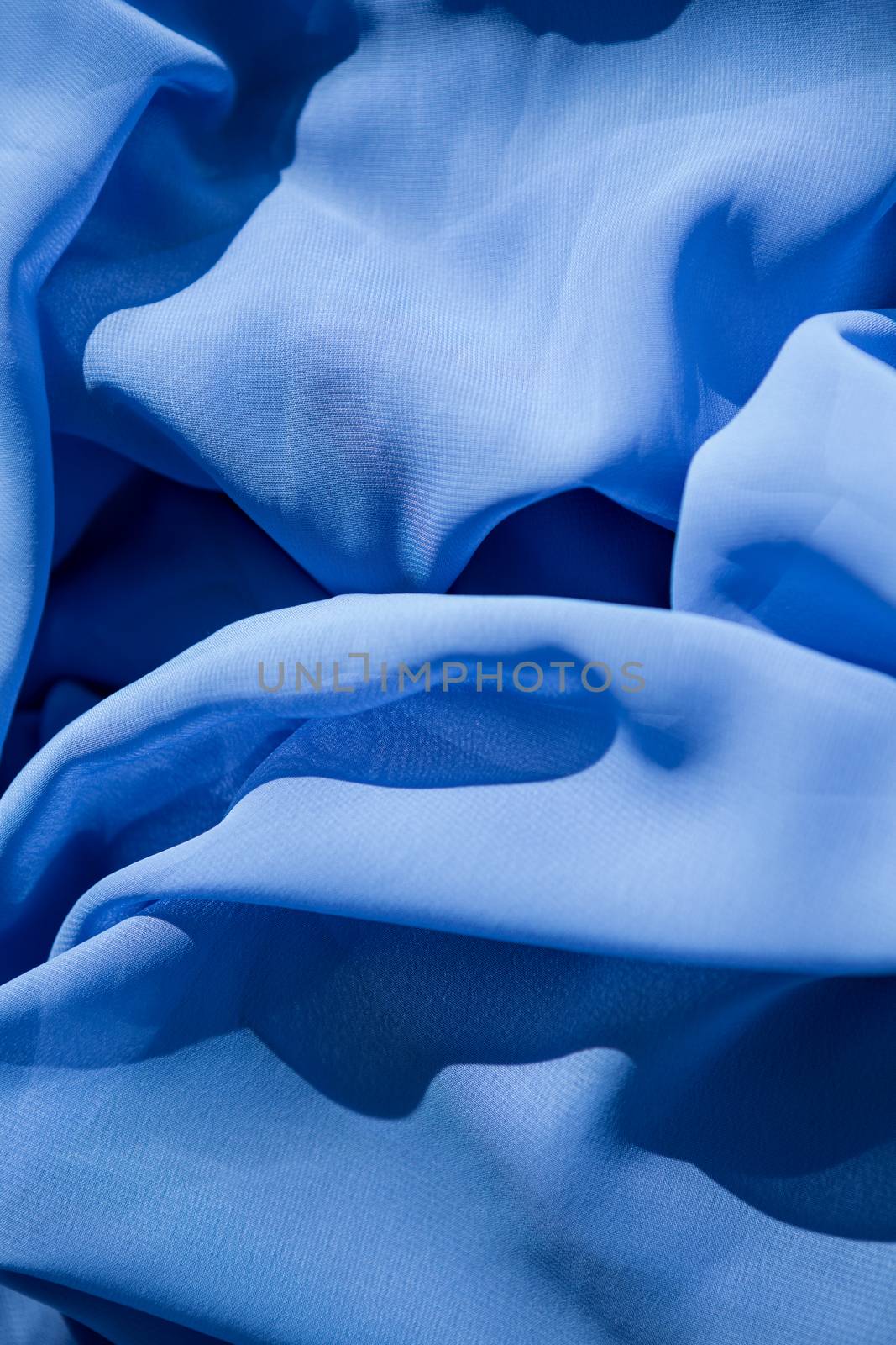 Close-up of blue fabric in the studio