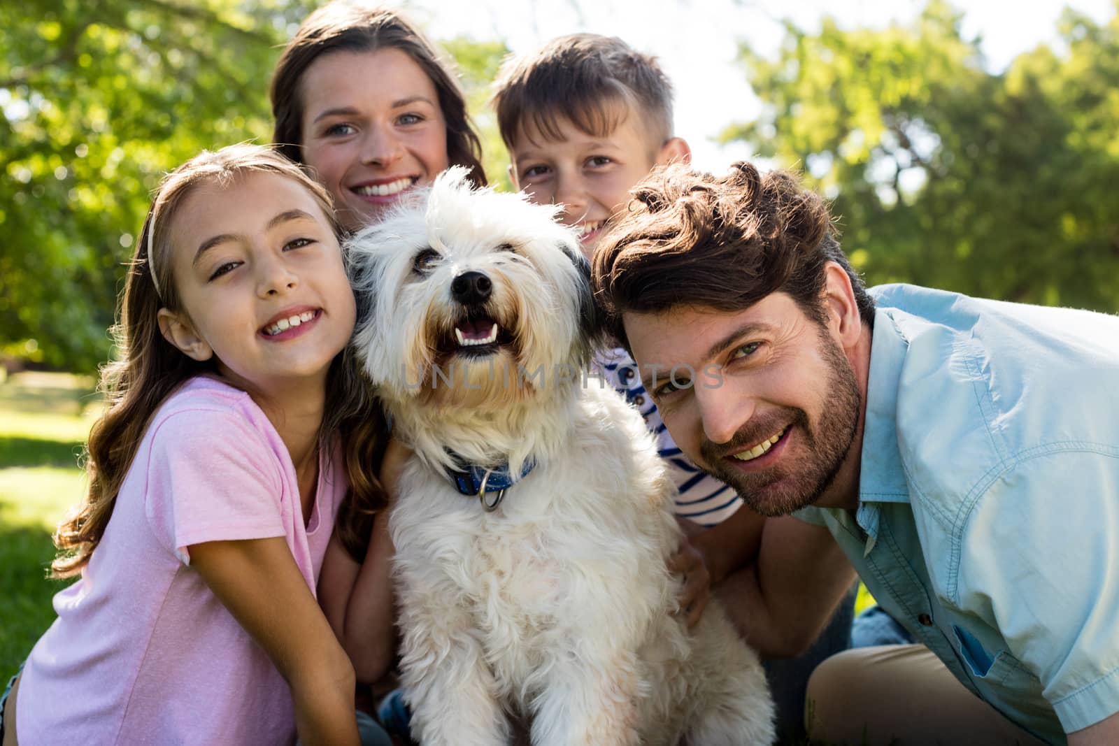 Happy family enjoying in park on sunny a day