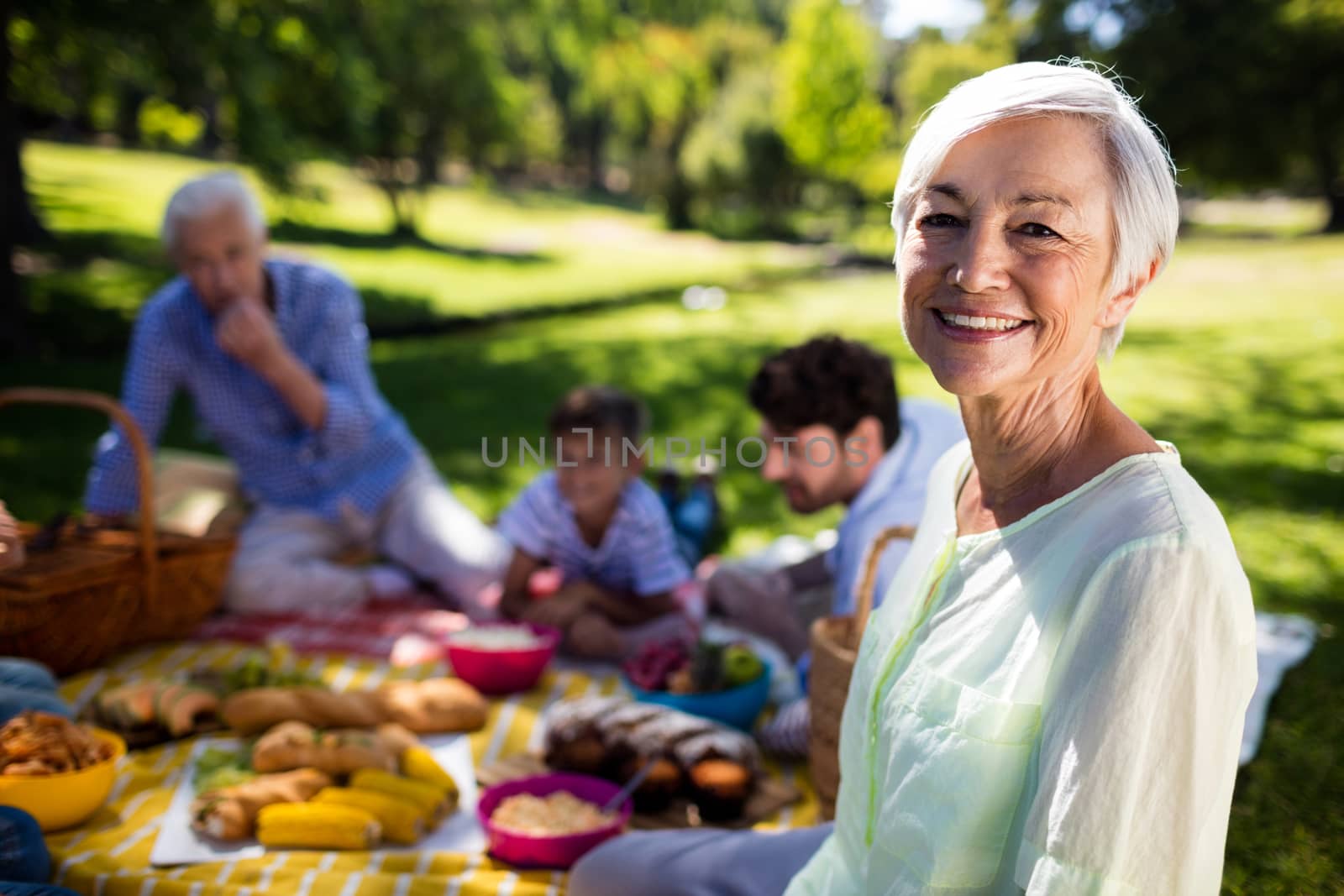 Happy family enjoying in park by Wavebreakmedia