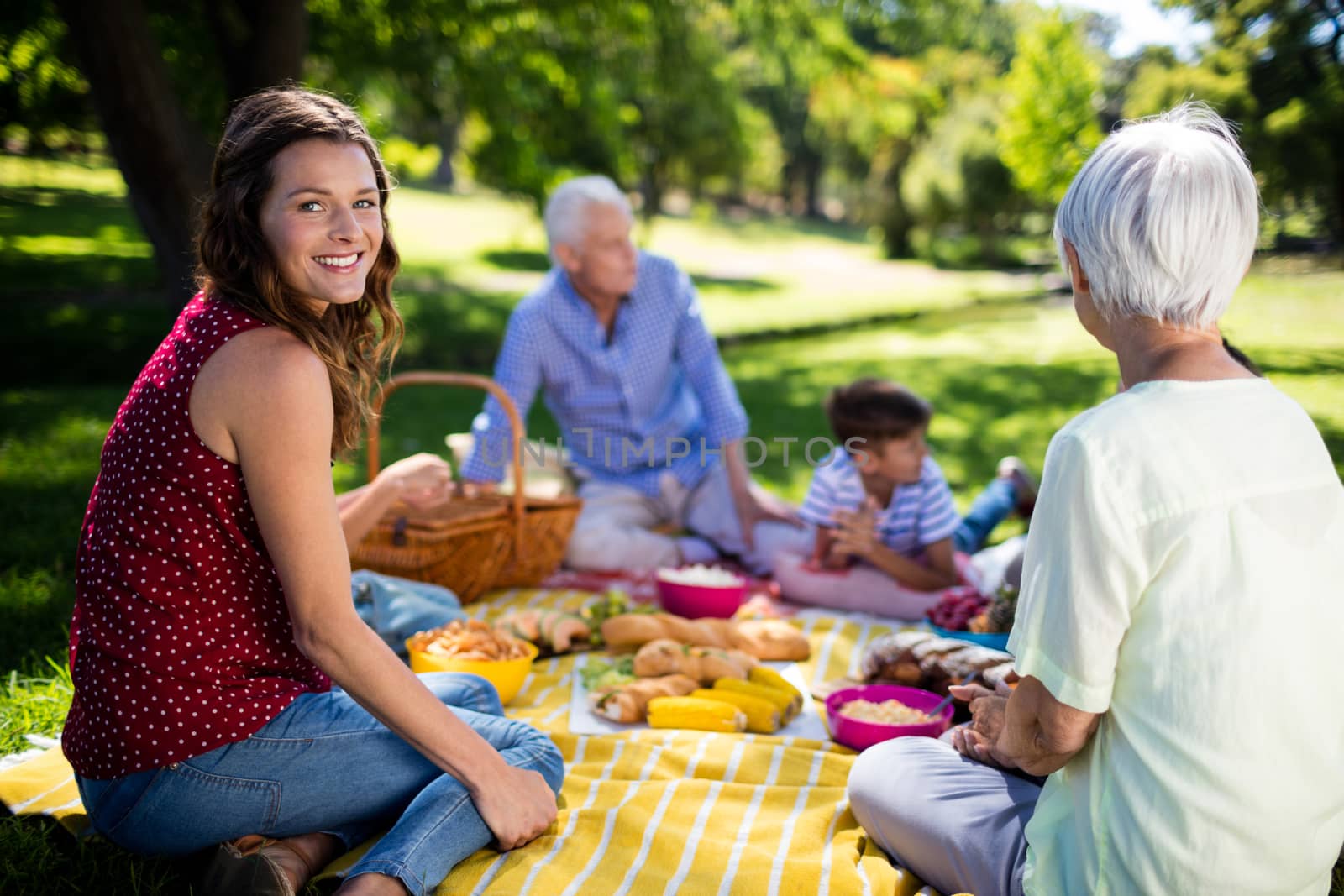 Happy family enjoying in park by Wavebreakmedia