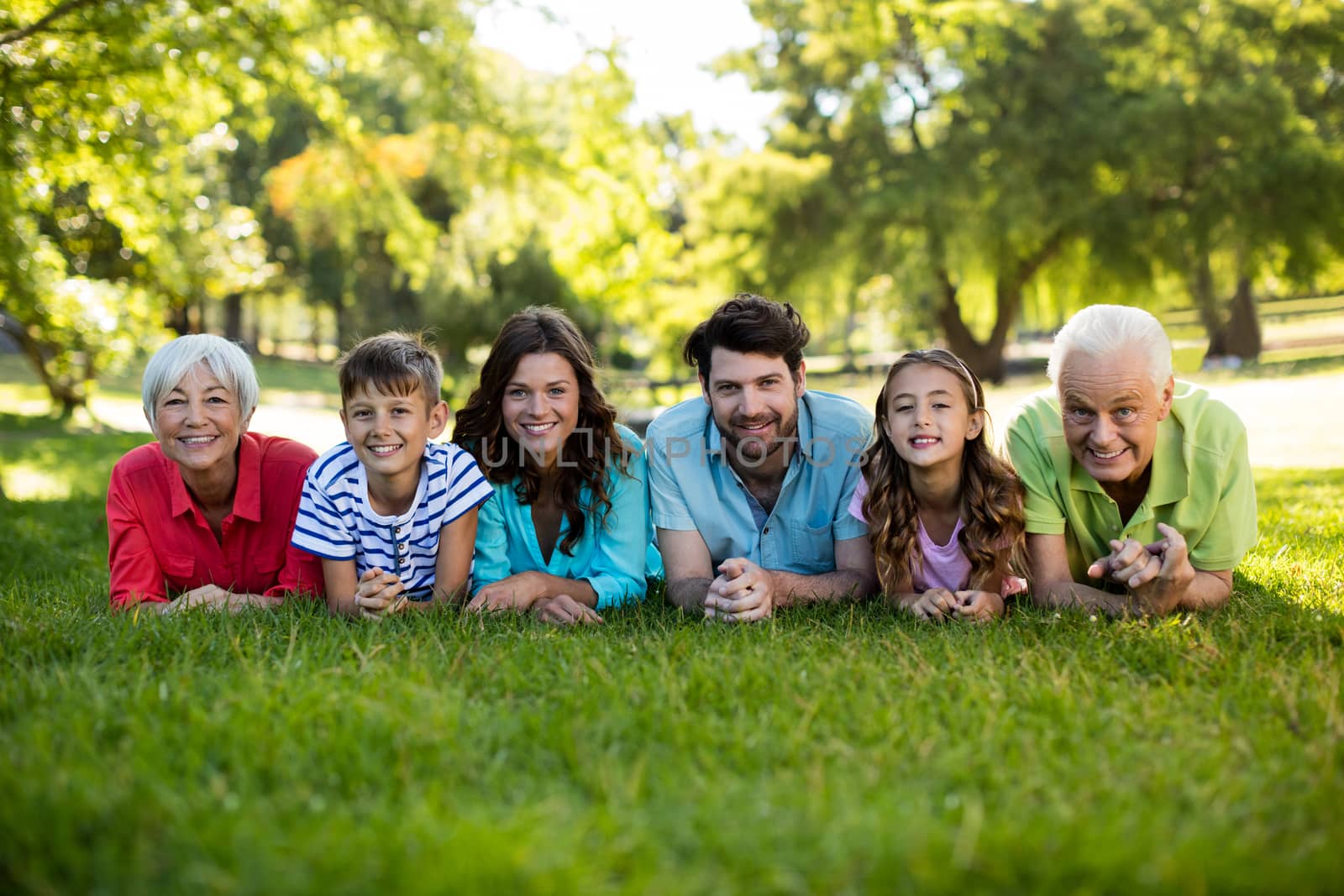 Happy family enjoying in park by Wavebreakmedia