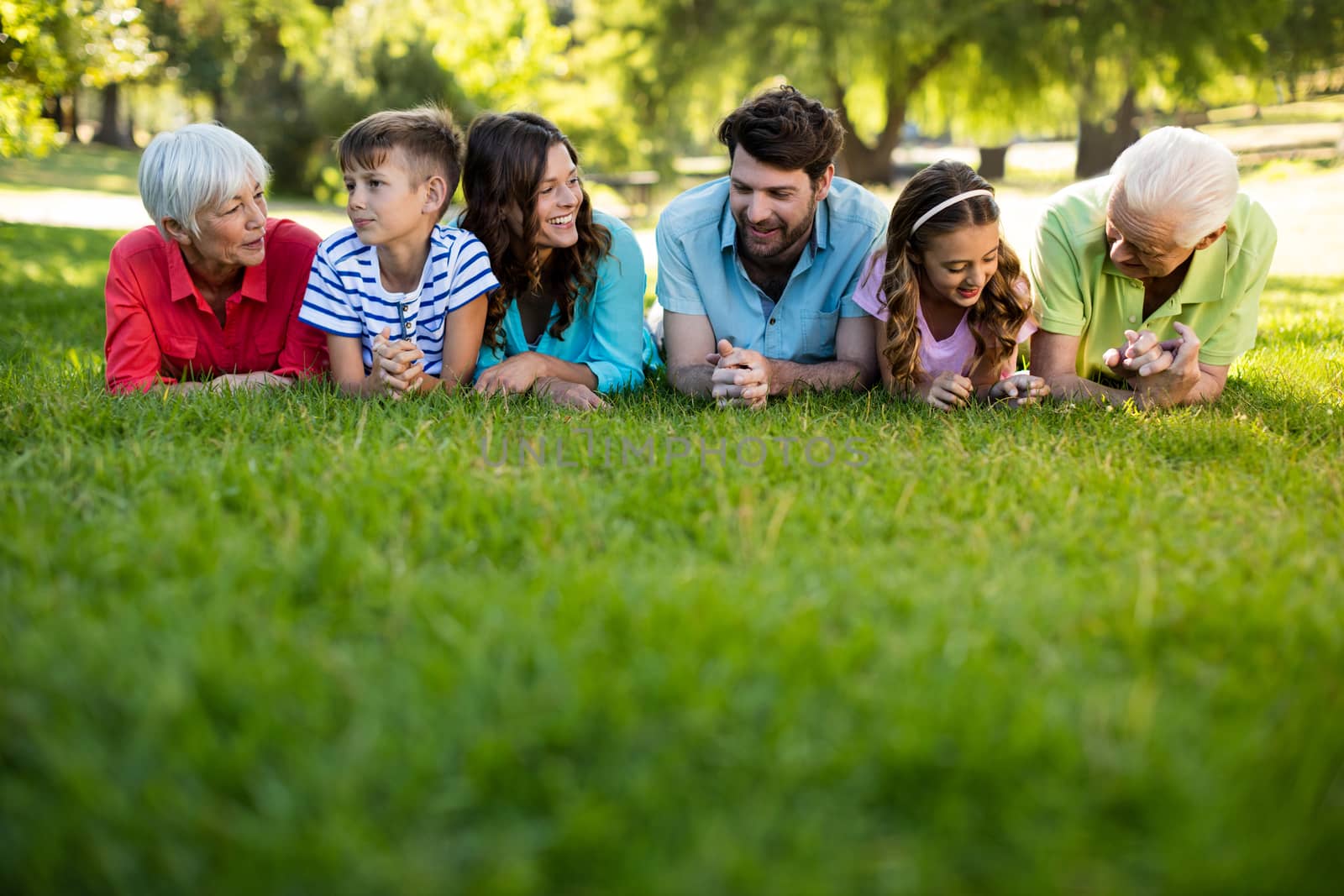 Happy family enjoying in park on sunny a day