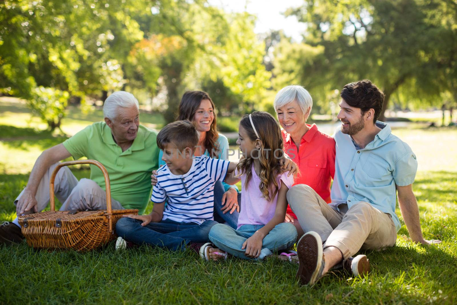 Happy family enjoying in park by Wavebreakmedia