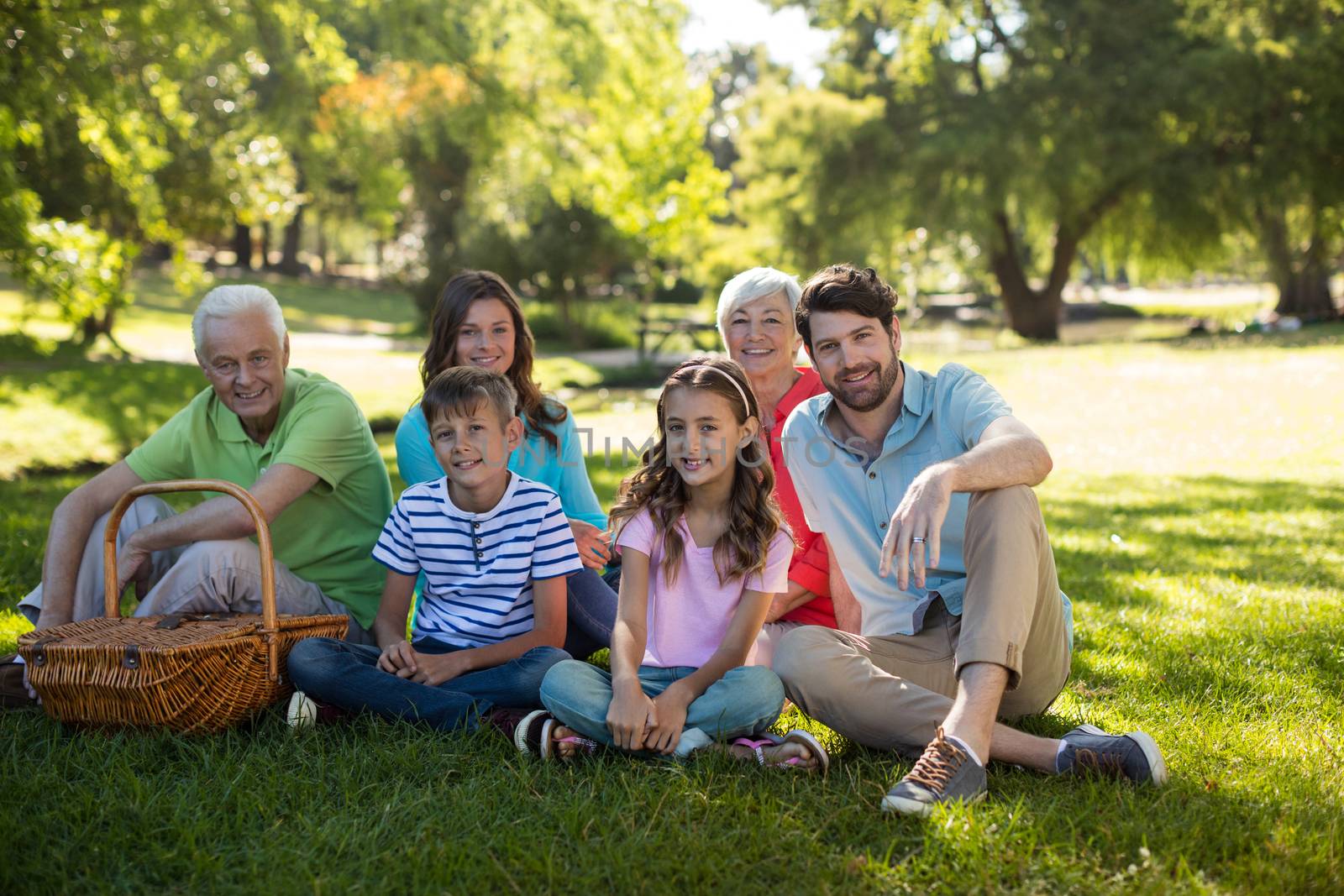 Happy family enjoying in park by Wavebreakmedia