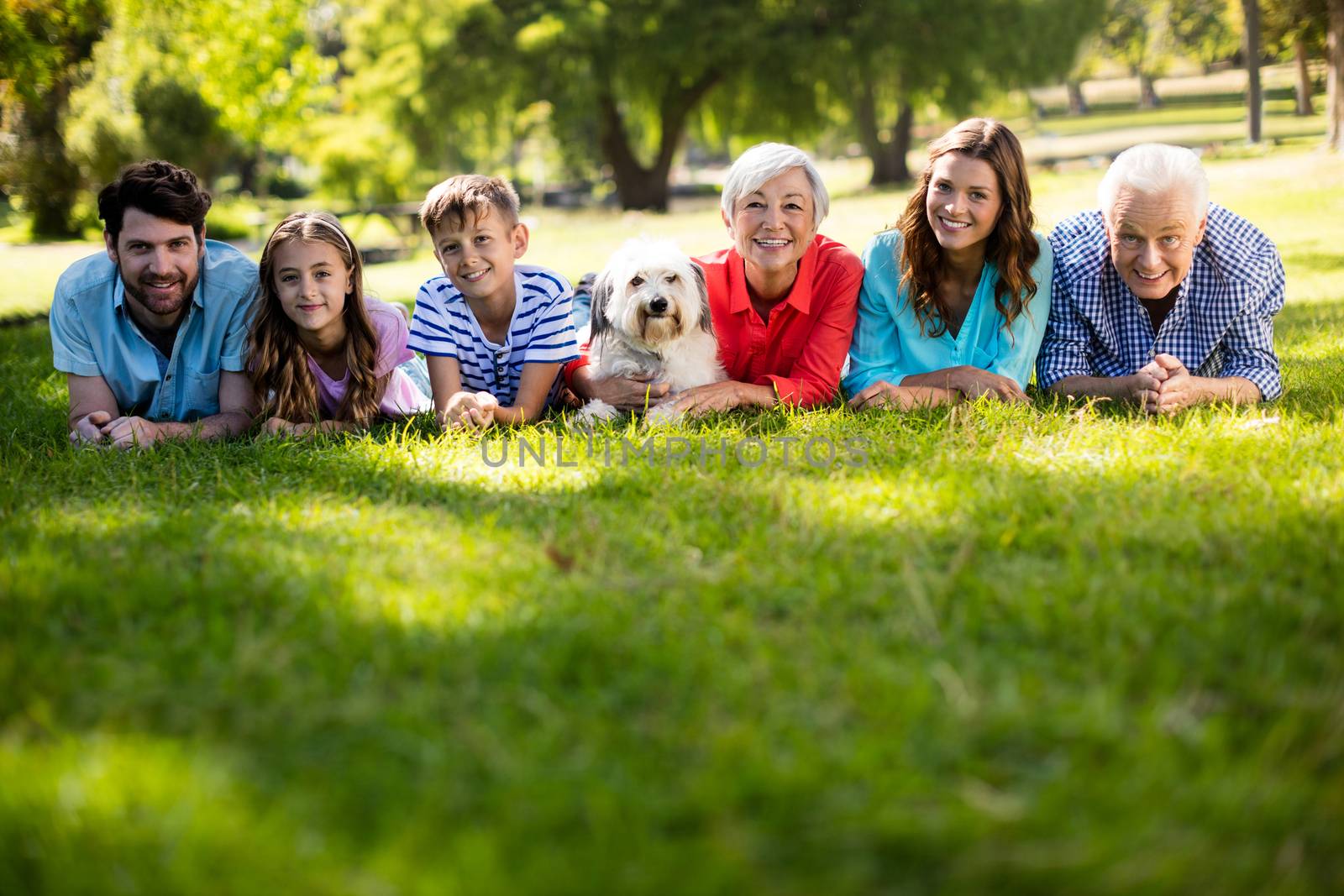 Happy family enjoying in park by Wavebreakmedia