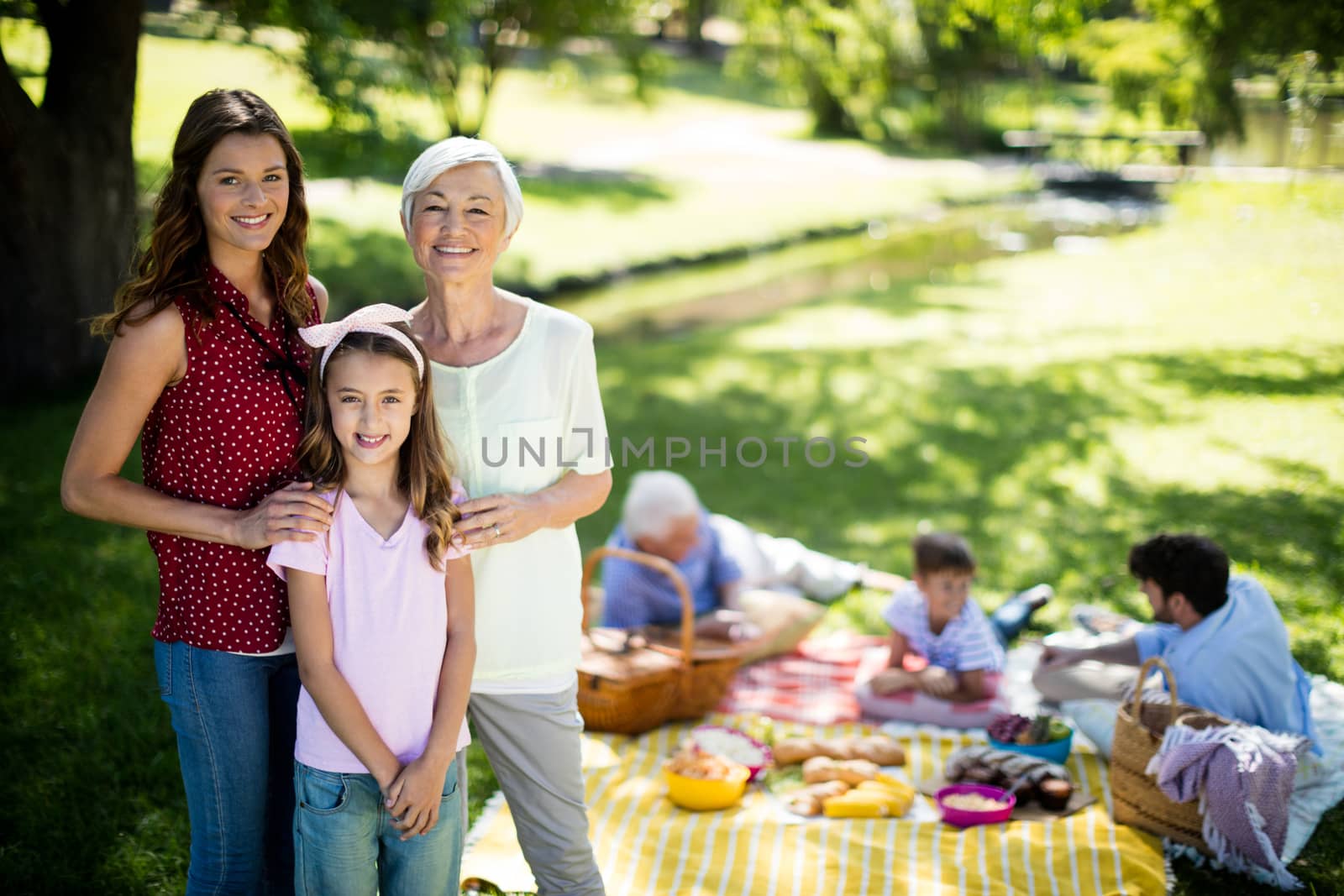 Happy family enjoying in park by Wavebreakmedia