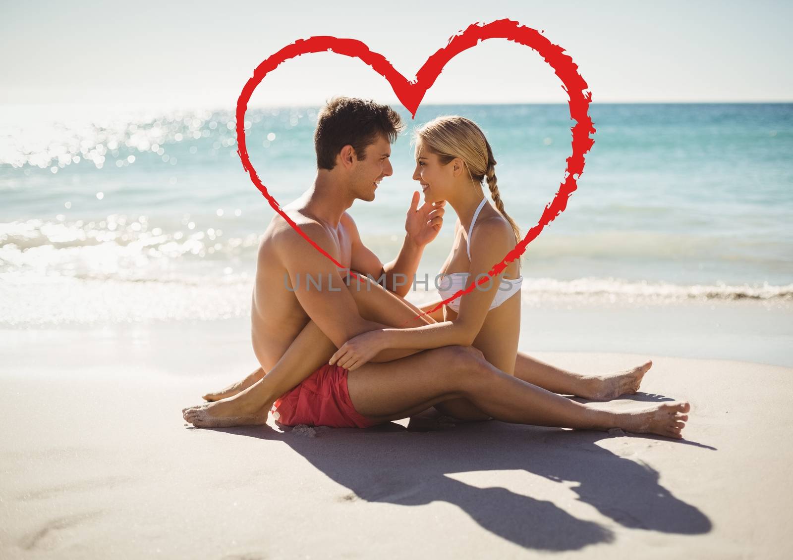 Romantic couple in love at beach by Wavebreakmedia