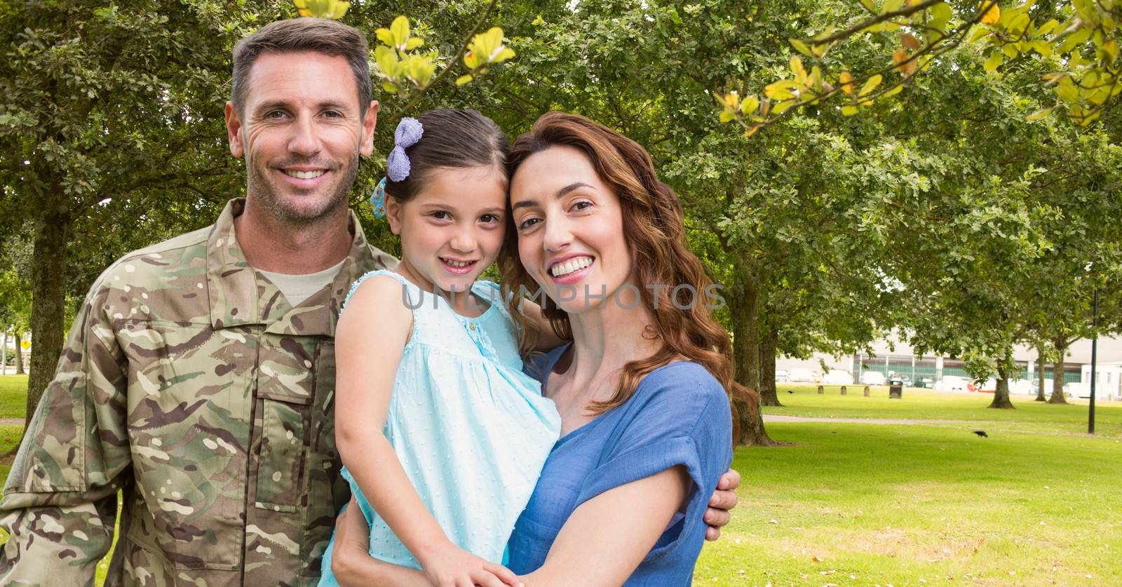 Soldier reunited with their family in park
