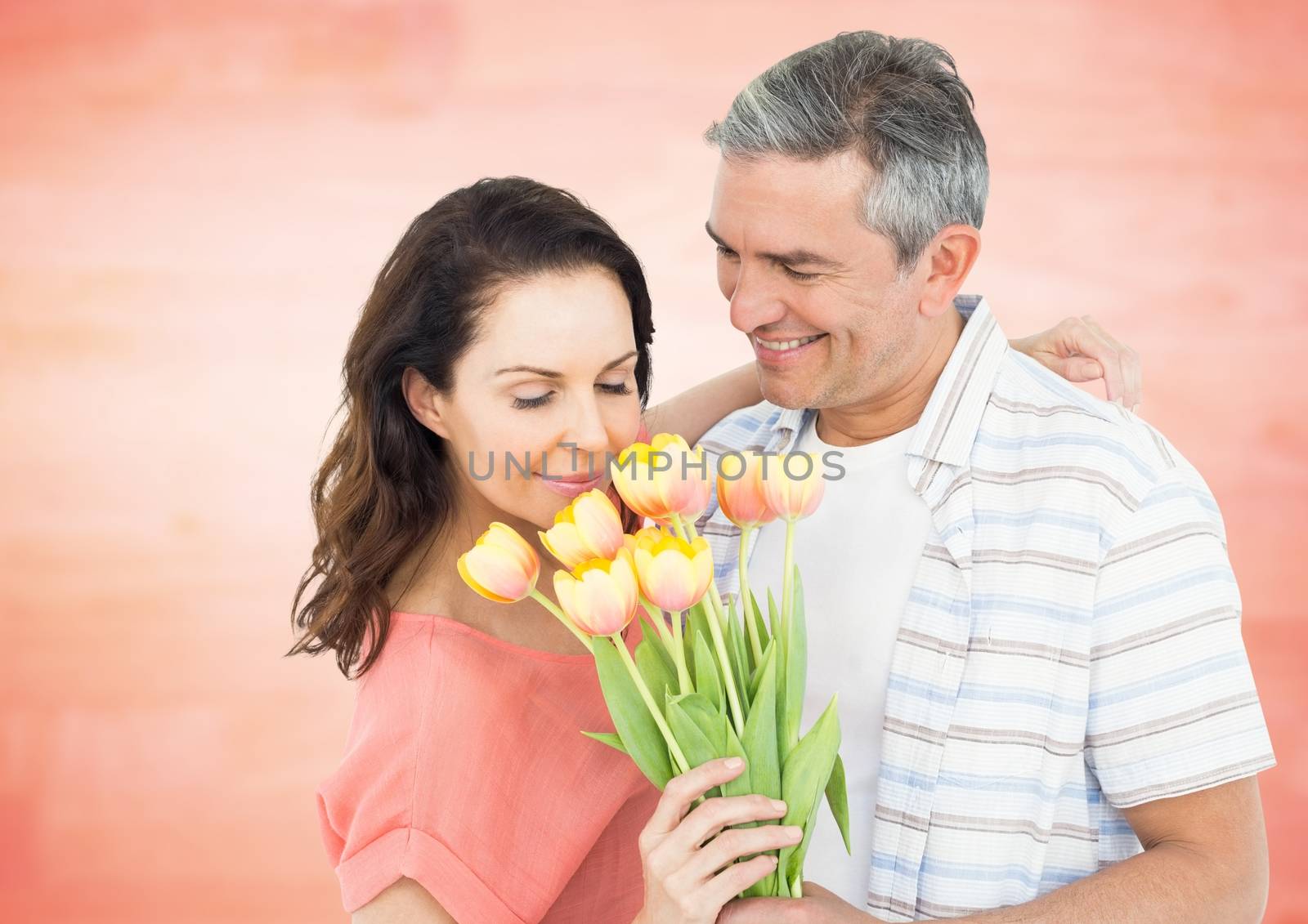 Romantic couple smelling roses by Wavebreakmedia