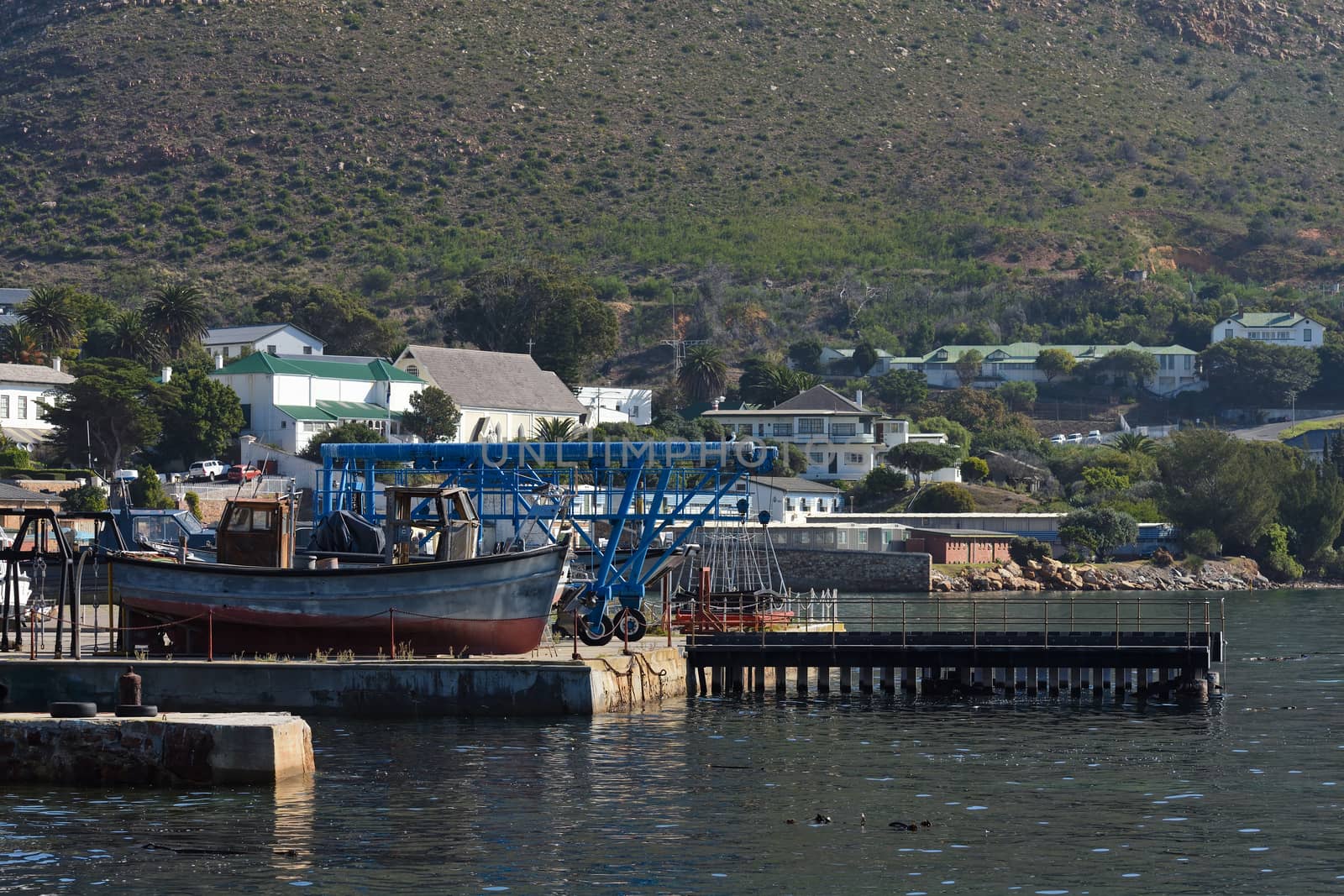 Stranded Boats At Simon's Town Boatyard by jjvanginkel