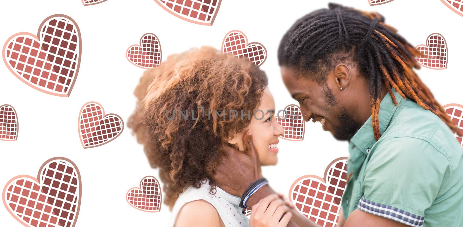 Young couple smiling and looking each others against background with hearts