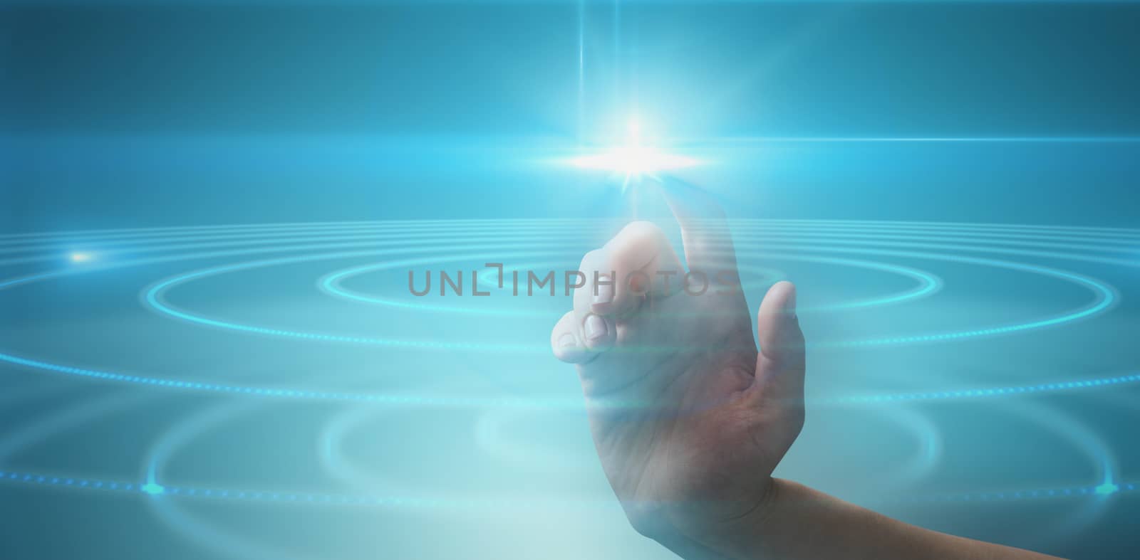 Close-up of cropped hand against futuristic shiny blue background