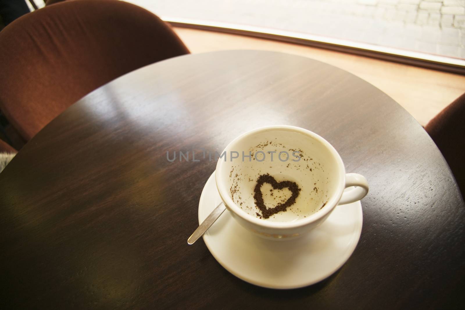 Tea leaves in a tea cup in the shape of a heart themes of tea love romance future