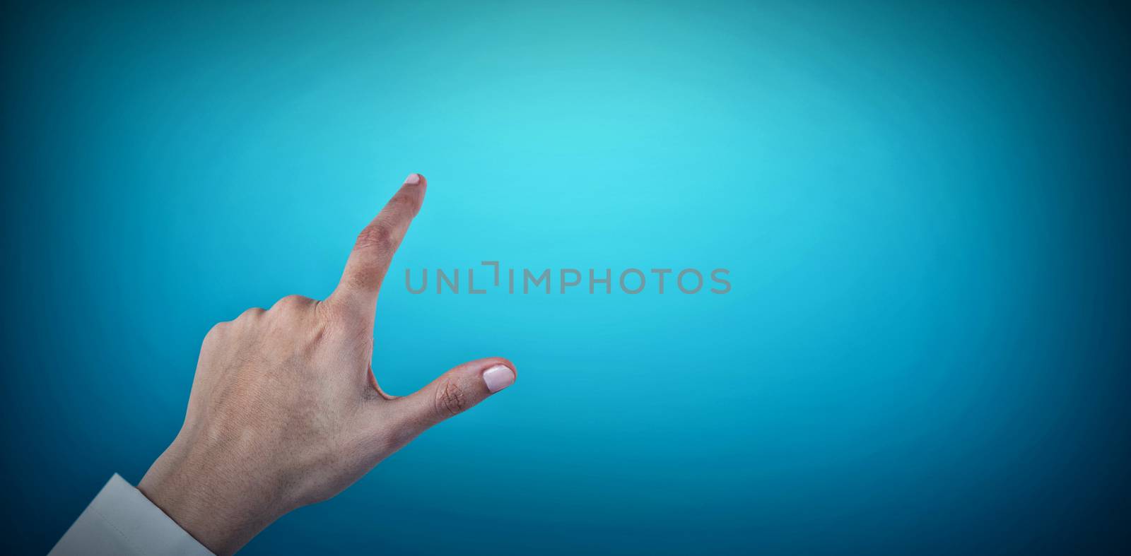 Hand of female doctor using digital screen against blue vignette background