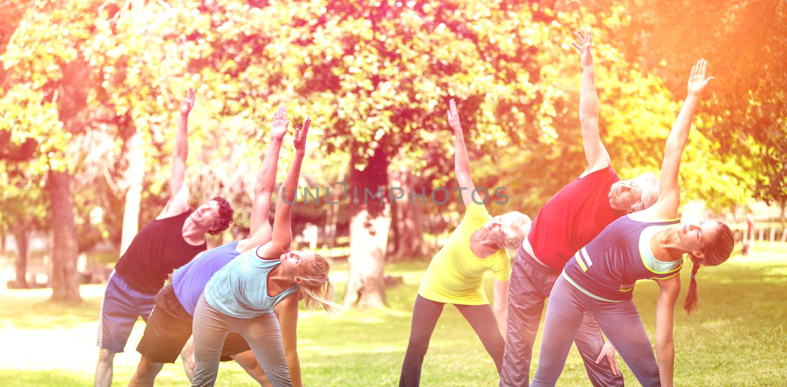 Fitness class stretching by Wavebreakmedia