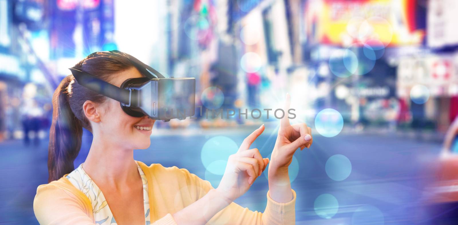 Woman using a virtual reality device against blurry new york street