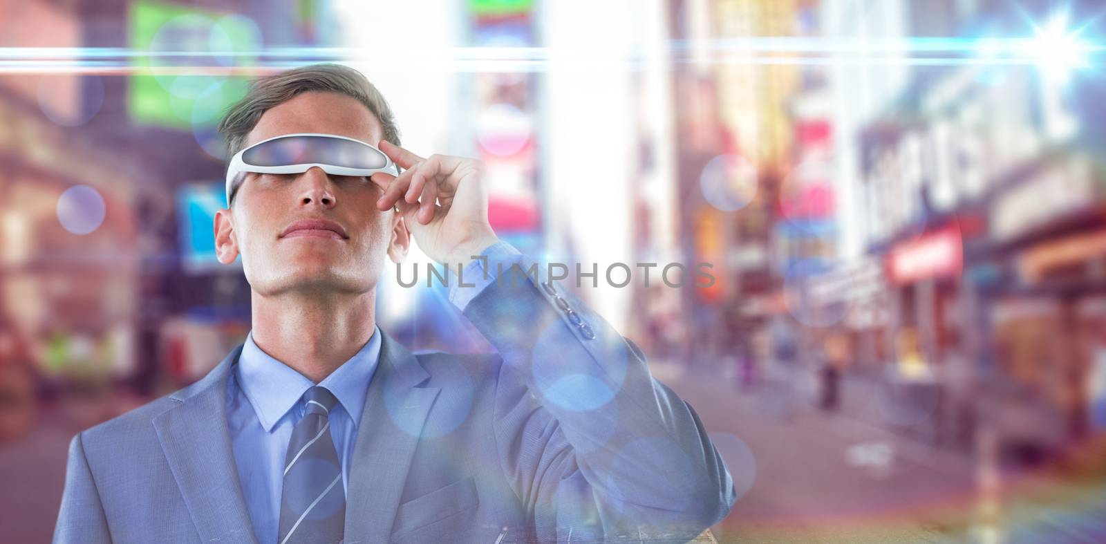 Composite image of businessman using virtual reality glasses against blurry background by Wavebreakmedia