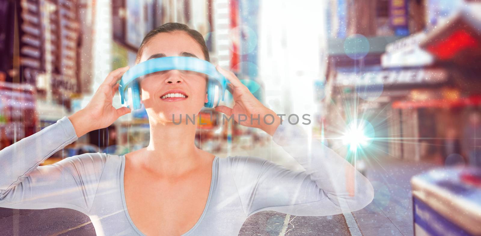 Smiling woman using virtual video glasses against blurry new york street