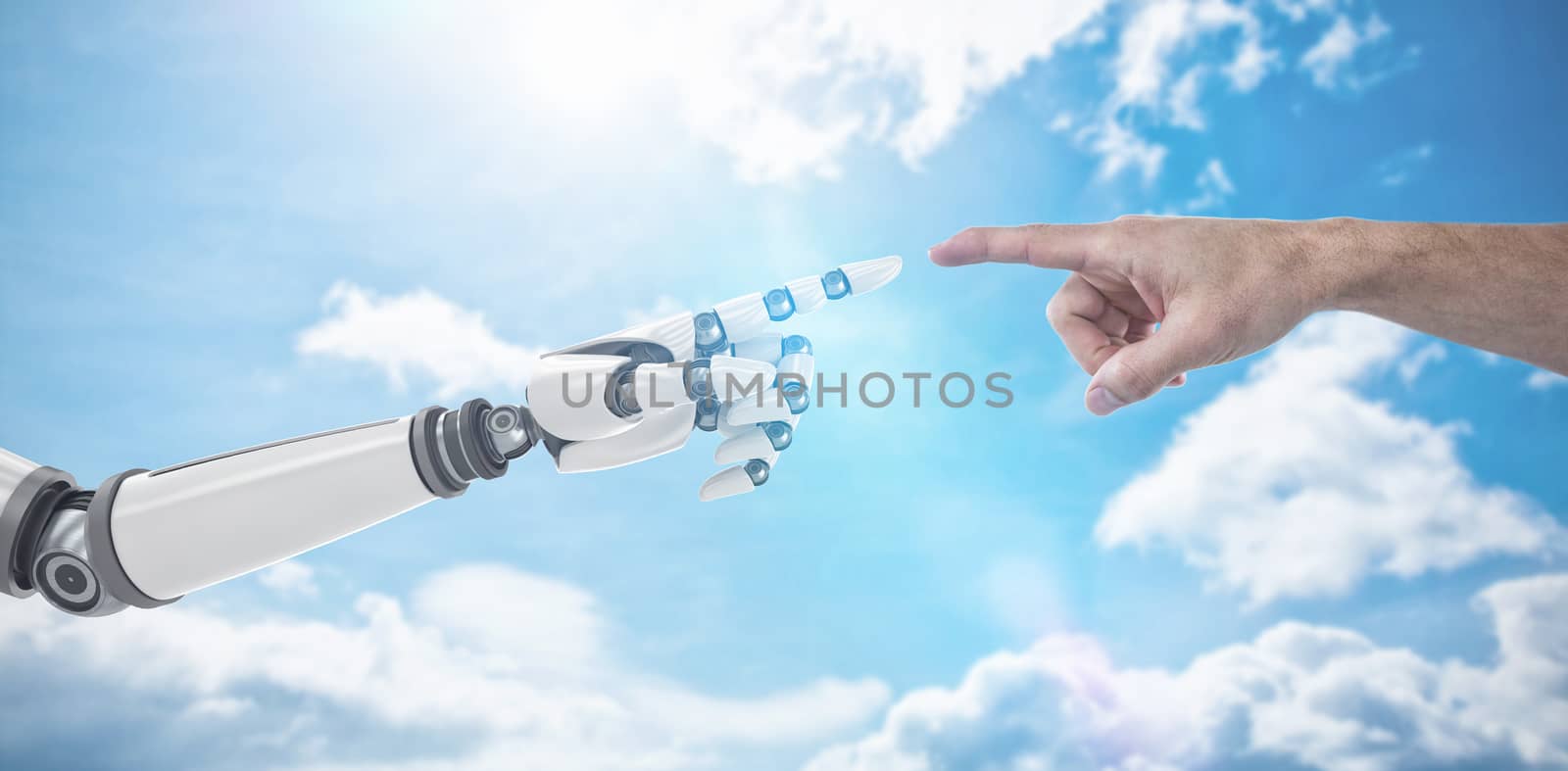 Hand of man pretending to touch an invisible screen against sky 