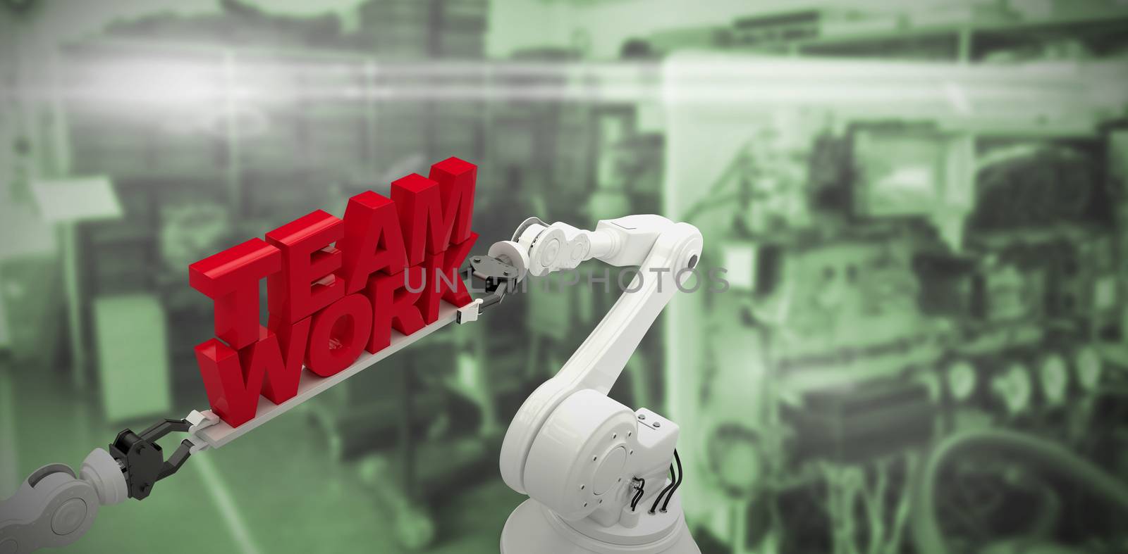 Composite image of close-up of robotic hand holding team work message by Wavebreakmedia