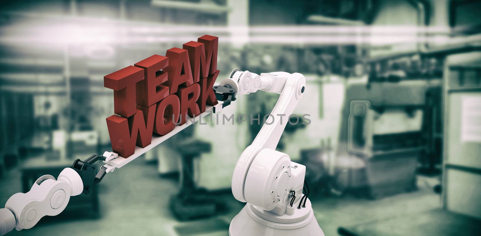 Robotic hand holding red team work text against factory