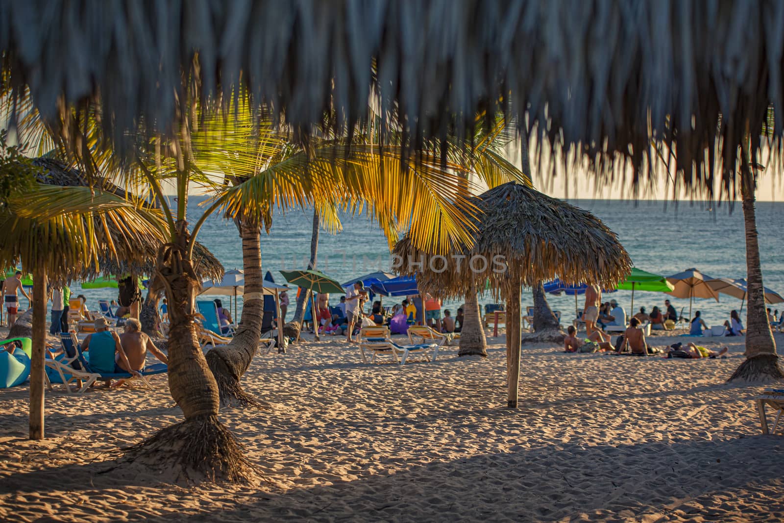 People on Dominicus Beach at sunset 11 by pippocarlot