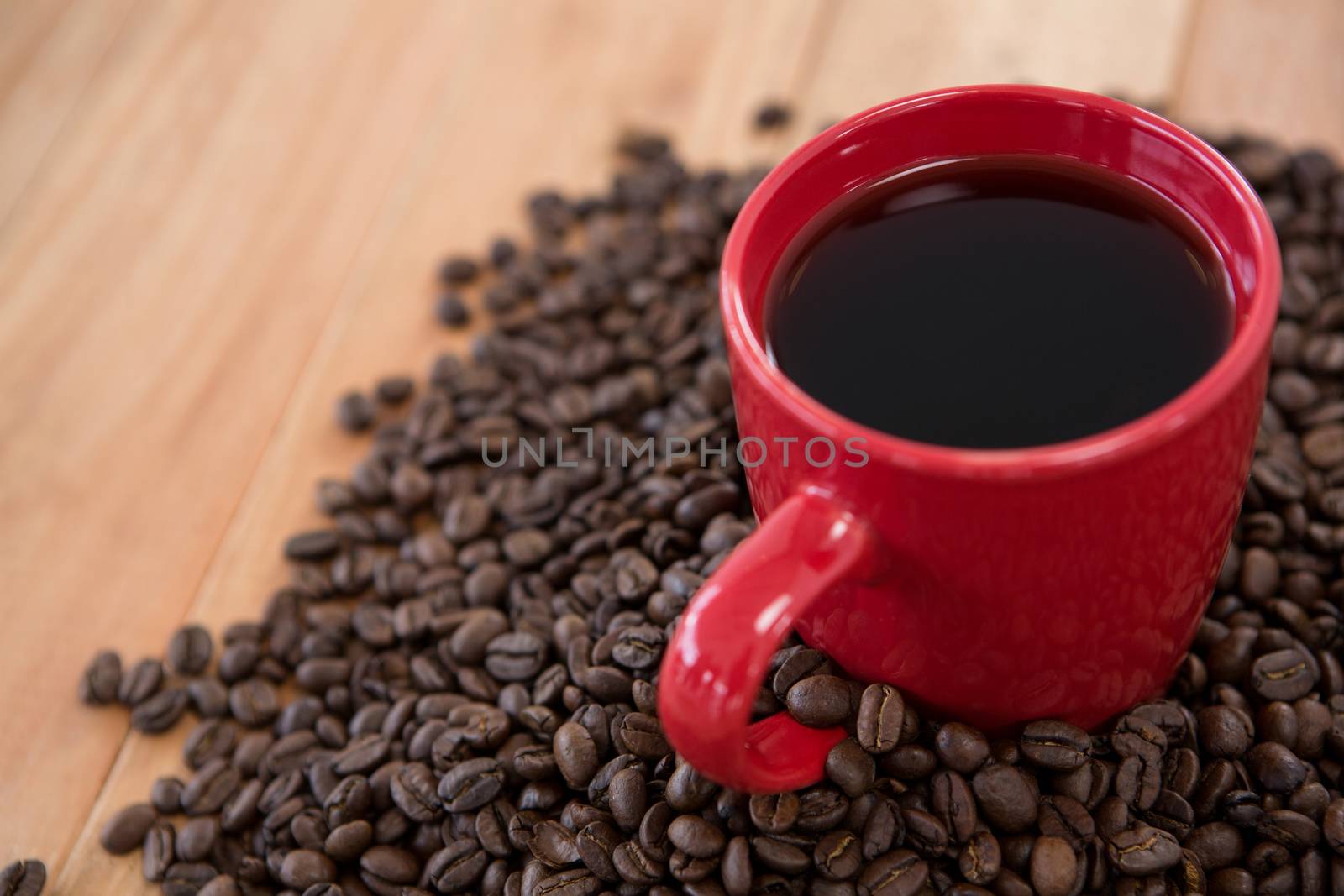 Coffee with coffee beans by Wavebreakmedia