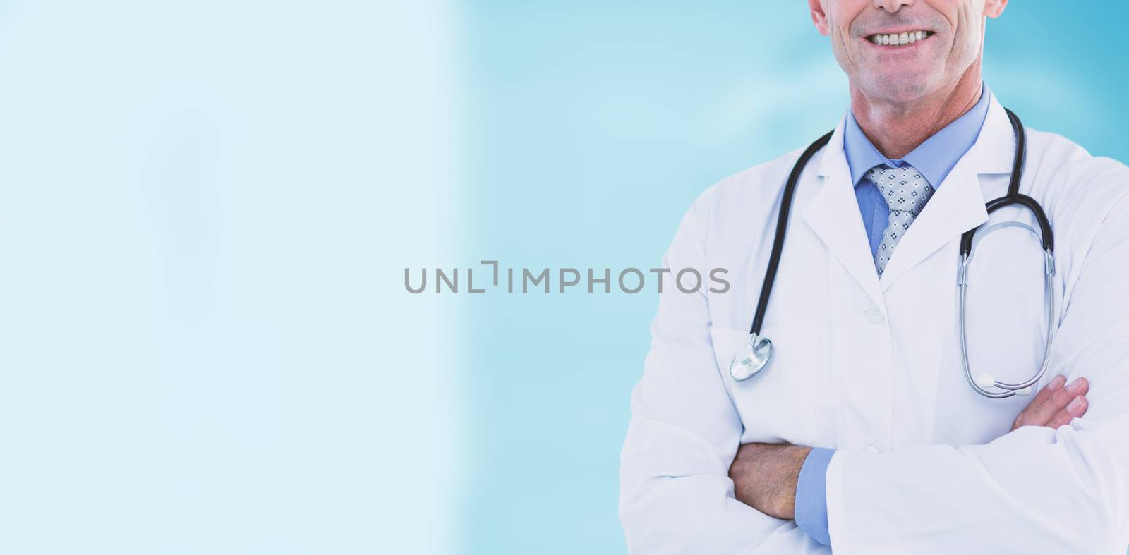 Portrait of confident male doctor against dental equipment