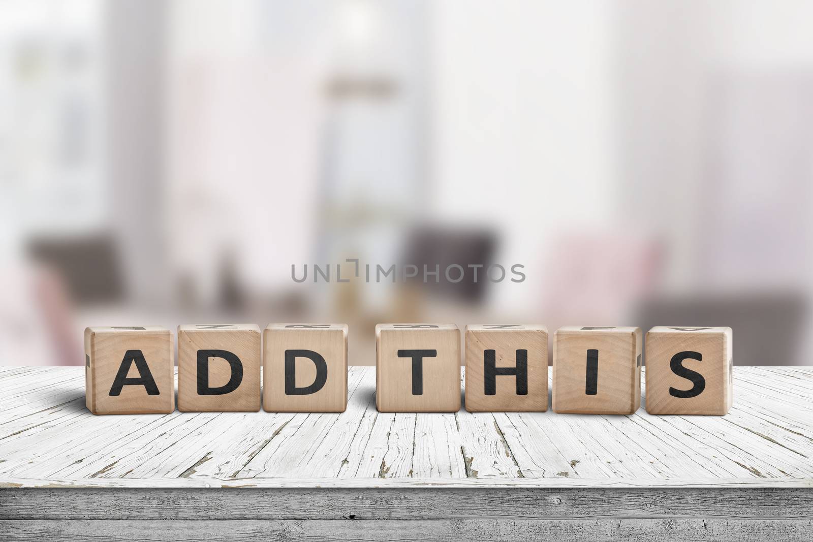 Add this message sign for social media posts in a bright room on a wooden desk