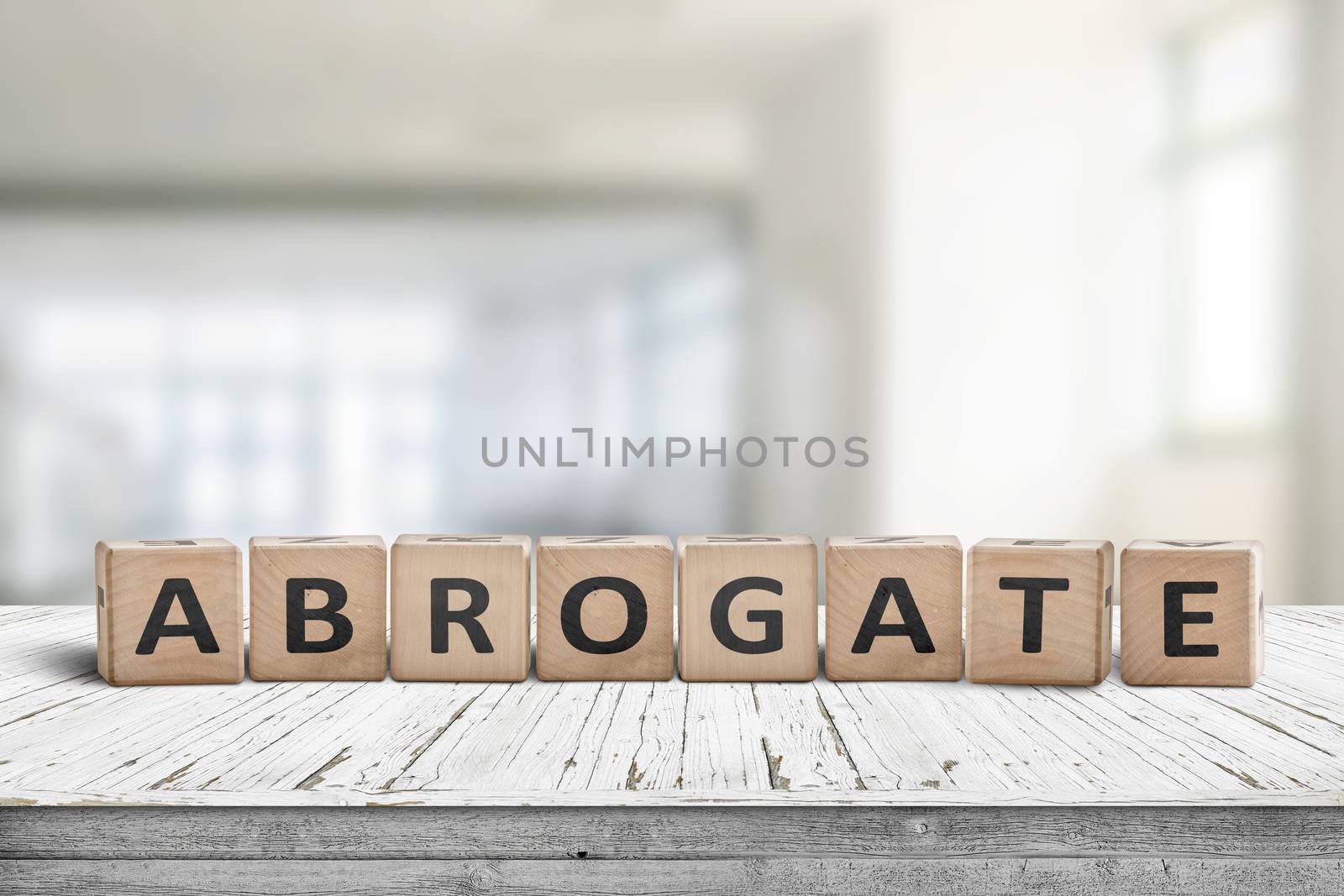 Abrogate sign made of wooden blocks on a white desk in a bright living room