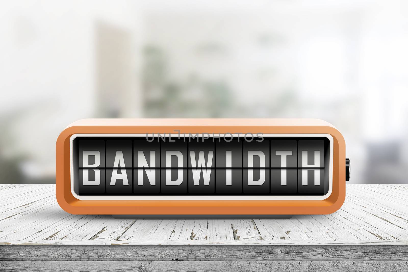 Bandwidth alarm message on a retro device in orange color in a bright room