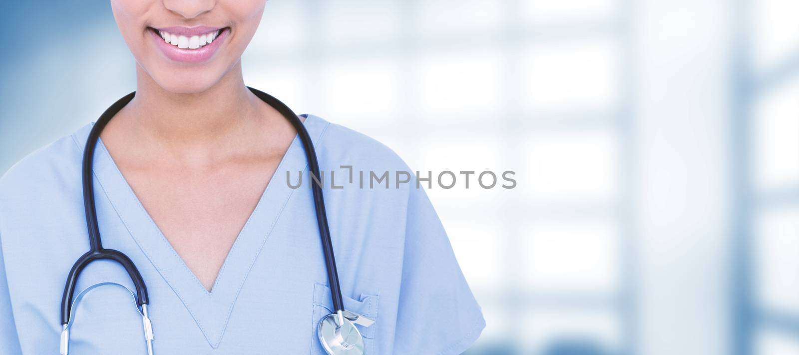 Portrait of smiling female surgeon against dental equipment