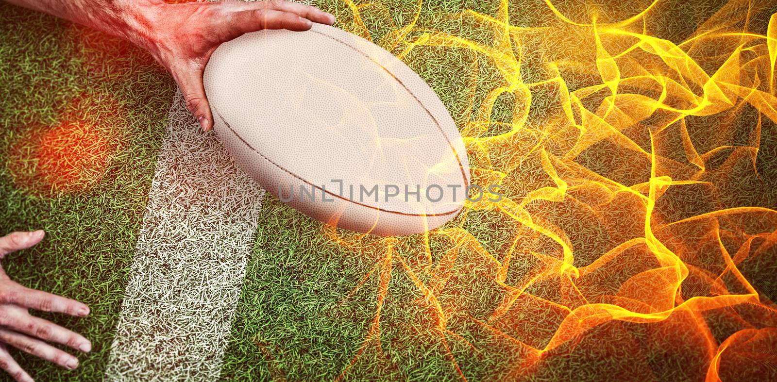 Composite image of a man holding rugby ball by Wavebreakmedia