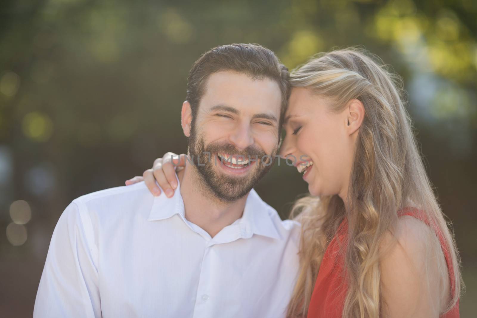 Couple enjoying in park on a sunny day by Wavebreakmedia