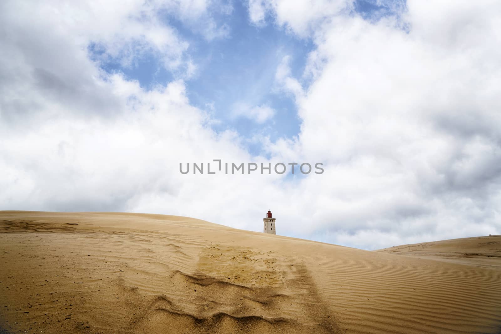 Lighthouse in the middle of a desert by Sportactive