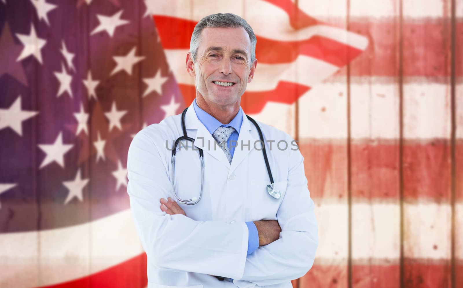 Portrait of confident male doctor against composite image of focus on usa flag