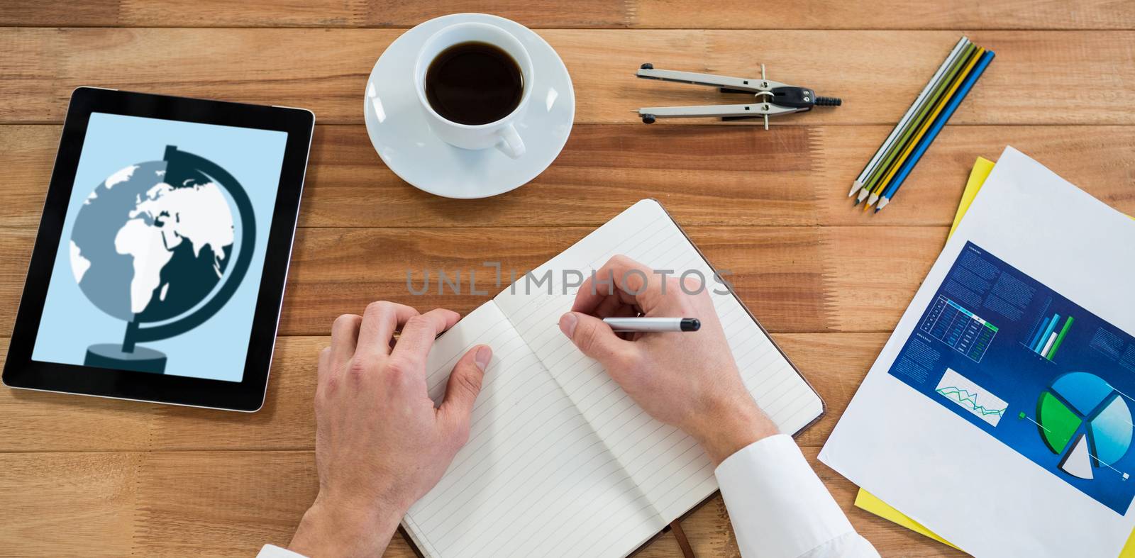 Print against businessman working at his desk