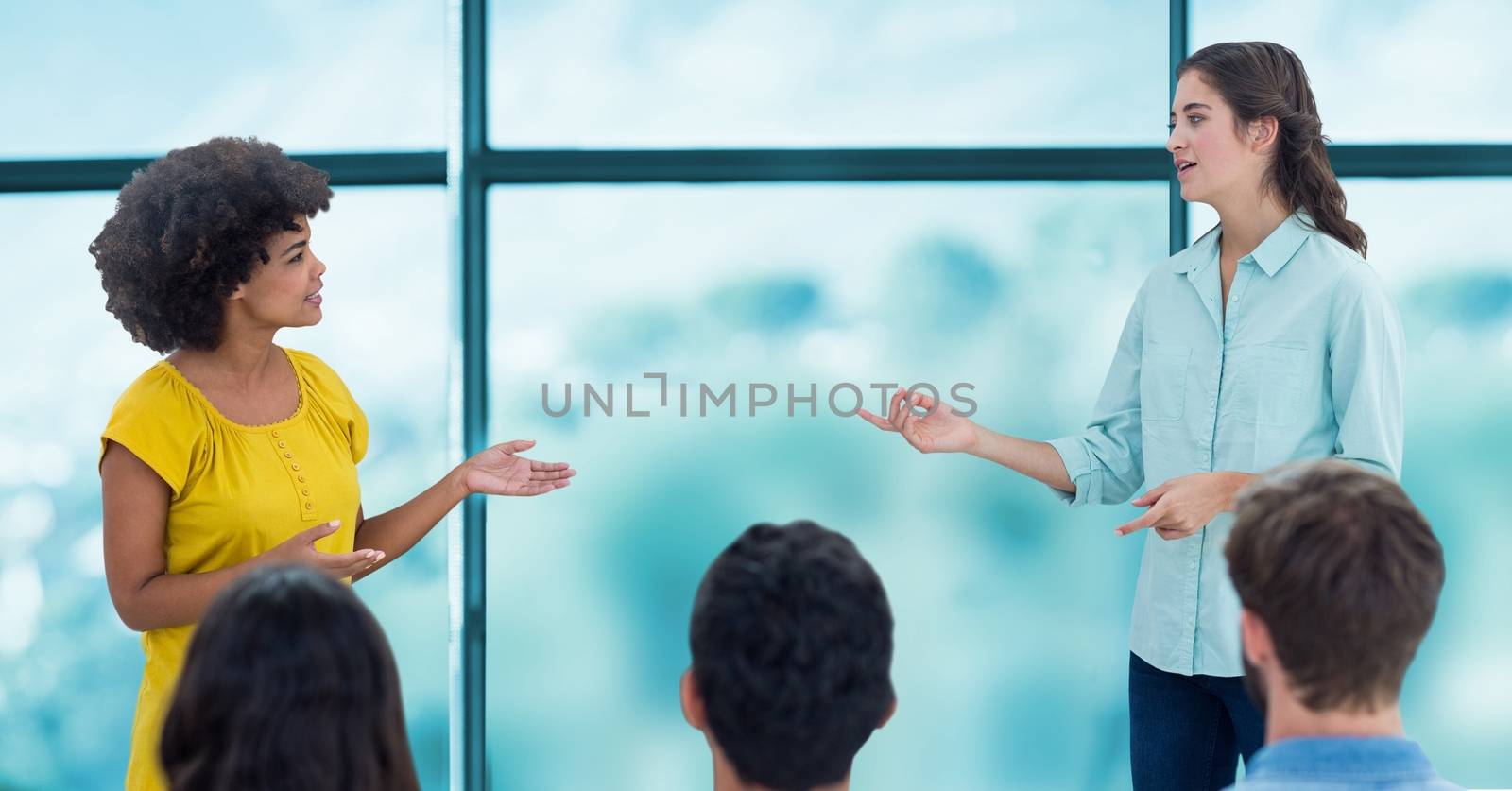 Digital composite of business people at presentation
