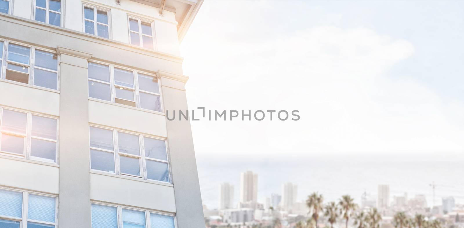 Composite image of modern building against clear blue sky by Wavebreakmedia